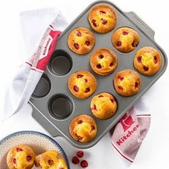 KitchenAid Bakeware 12 Cup Muffin Pan 3 KitchenAid Bakeware 12 Cup Muffin Pan -Tiffany & Co. Shop CC003296 001 KitchenAid Bakeware 12 Cup Muffin Pan 1